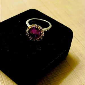 Lady’s ring; faux amethyst and crystals.